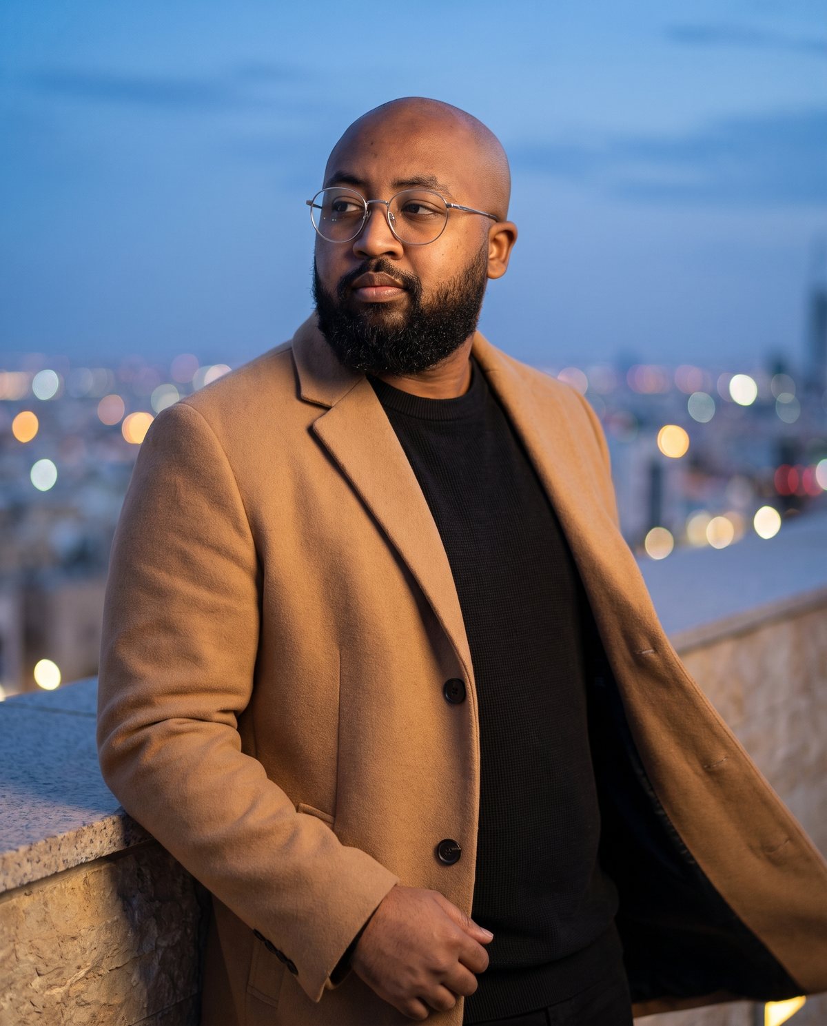 Mohammed Samir Gaber on a Riyadh rooftop at blue hour